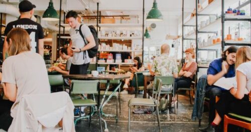 People in busy cafe