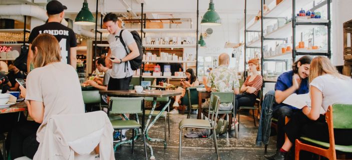 People in busy cafe