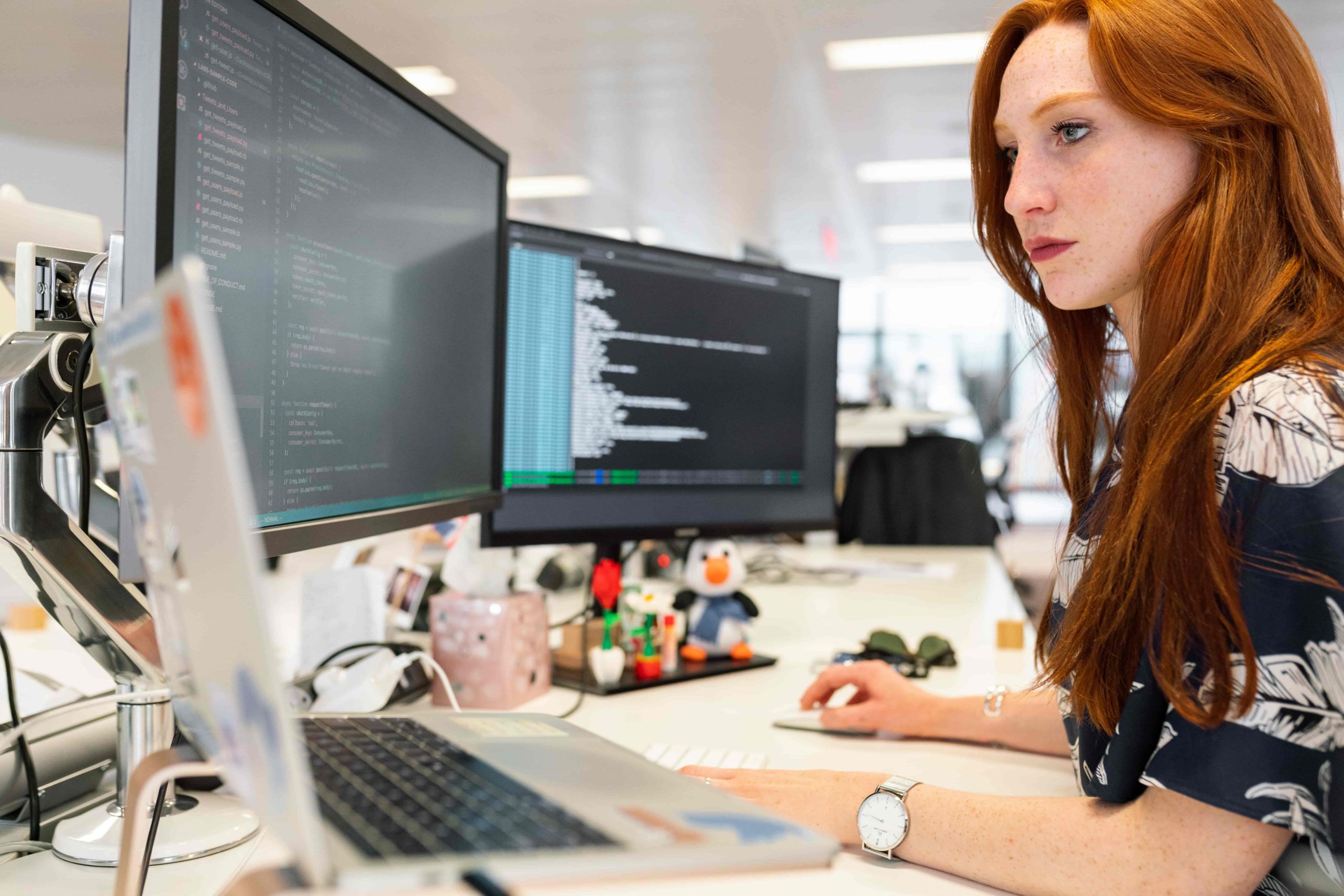 A person working on a computer in office